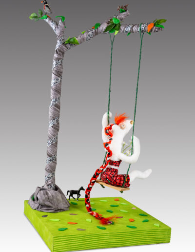 Maiden, back, 24” H x 12” W x 12” D, fabric, shells, hair, plastic, wood on a wire armature, $950